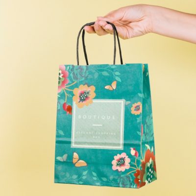 hand holding shopping bag mockup 23 2147934826